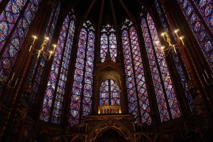 Picture of the center stained class windows around the altar of Sainte Chapelle in Paris, France.