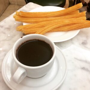 Picture of churros and hot chocolate from San Gines in Madrid, Spain.